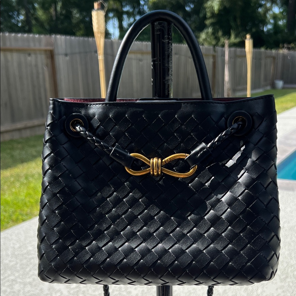Chic Black Small Woven Shoulder Bag with Gold Accent.